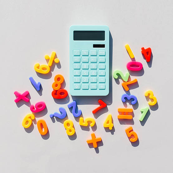 Blue calculator and math symbols on a universal gray background. Gray background. Blue calculator. Math symbols.